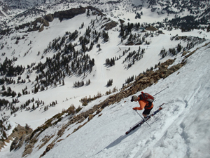 A skier drops in on Altas Main Baldy Chute. Photo by Jared Hargrave
