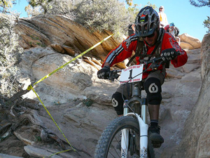 A downhill racer at the Moab Ho-Down Bike Festival