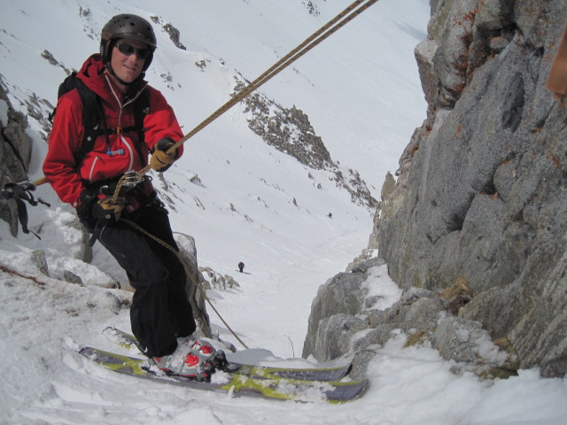 The mandatory ski rappel in the Northwest Couloir of the Pfeifferhorn.