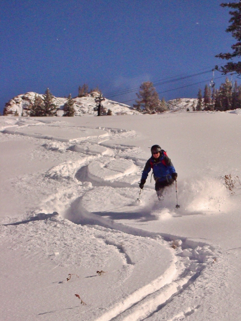 In a nod to "Aspen Extreme," Mason makes figure 8s with the author's tracks at Alta.
