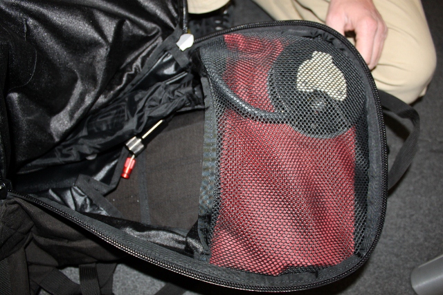 A look inside the new Mystery Ranch avalanche airbag pack, wit the airbag loaded in the top pocket. (Photo: Jared Hargrave - UtahOutside.com)