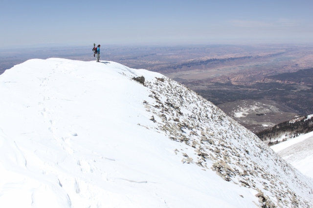A summit with a killer view - Mount Tukuhnikivatz in winter. (Skier: Adam Symonds. Photo: Jared Hargrave - UtahOutside.com)