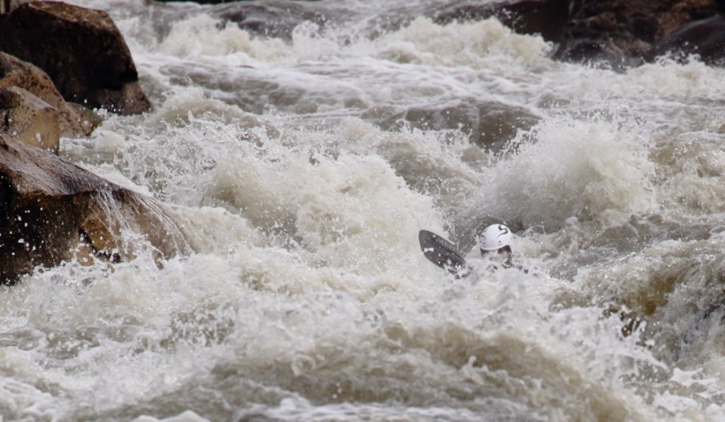 A kayaker gets buried in Boo Boo rapid (Photo: Will Taggart)