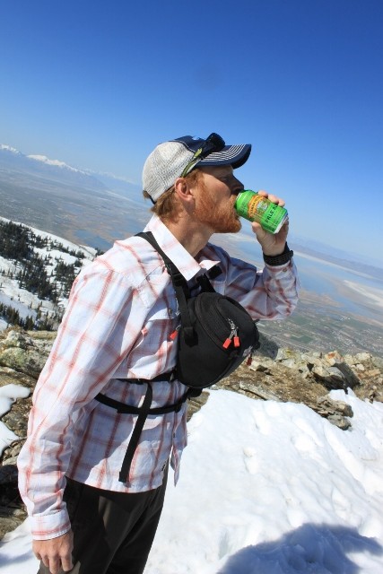 Enjoying a cold one atop a Utah peak on a warm spring day with the Mountain Khakis Equatorial shirt. (Photo: Dave Thieme)