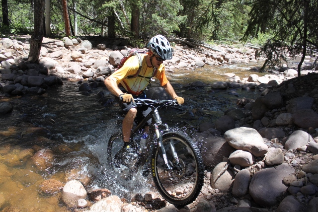 There are a few creek crossings on the Flume Trail, so be prepard to get your feet wet. (Photo: Jared Hargrave - UtahOutside.com. Rider: Mike DeBernardo)