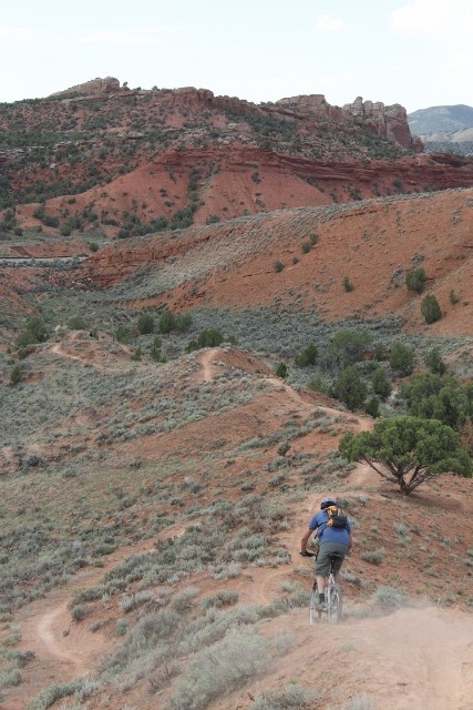 Knife-edge descents on dinosaur backs make Jass-Chrome Molly similar to the 18 Road trails in Fruita, Colorado. (Rider: Adam Symonds. Photo: Jared Hargrave - UtahOutside.com)