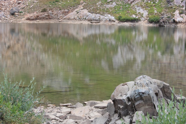 Cecret Lake, reflective and inviting-but no swimming allowed. (Photo: Dave Zook)