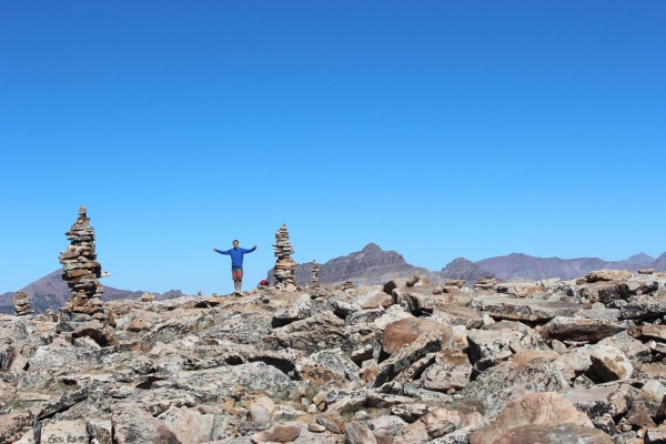 Dave stands with the cairns on the summit of Bald Mountain. (Photo: Dave Zook)