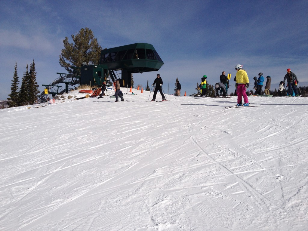 skiers and boarders riding at brighton resort