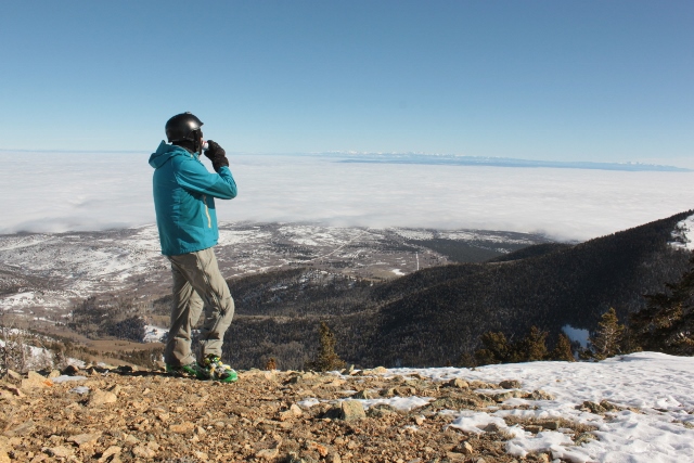 Adam Symonds enjoys a beer in the sun on the summit of Horsehead Peak. (Photo: Jared Hargrave - UtahOutside.com)