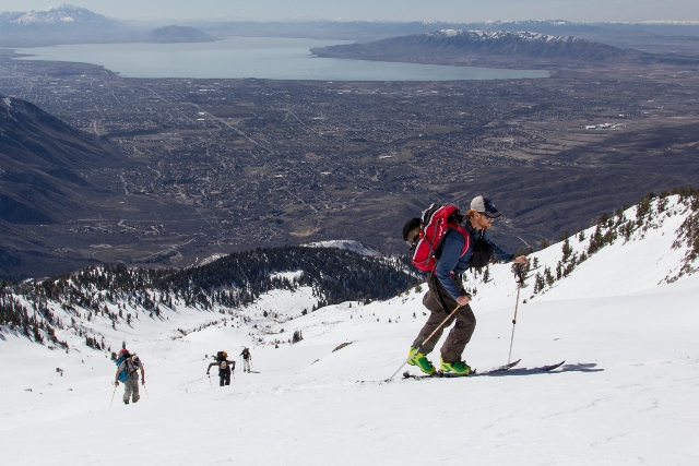 The gang ascends the south face of Lone Peak, with Utah Lake and the city far below. (Photo: Mike DeBernardo)