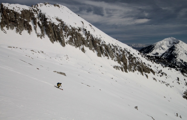 Mike DeBernardo skis below the cliffs surrounding Bighorn Peak, which lies east of Lone Peak. (Photo: Jared Hargrave - UtahOutside.com)