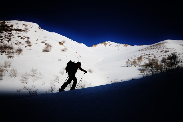 Backcountry ski touring in the Oquirrh Mountains below Rocky and Lowe Peak . (Skier: Jon Strickland. Photo: Jared Hargrave - UtahOutside.com)