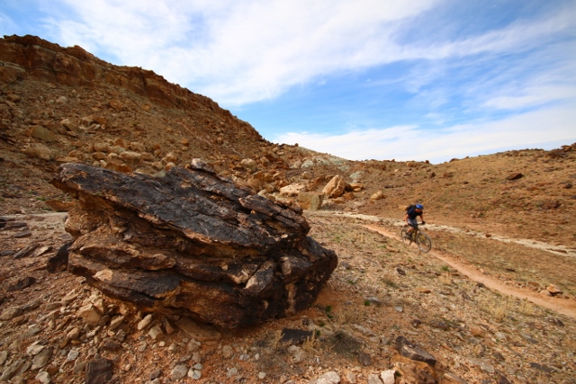 Adam Symonds samples the new singletrack at Klondike Bluffs in Moab. (Photo: Jared Hargrave - UtahOutside.com)