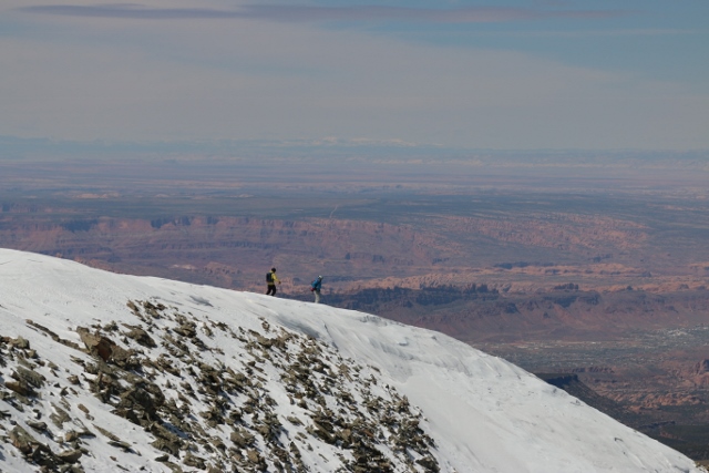 Adam Symonds and Mike DeBernardo stand atop Haystack Mountain with Moab's red rock desert far below. (Photo: Jared Hargrave - UtahOutside.com)