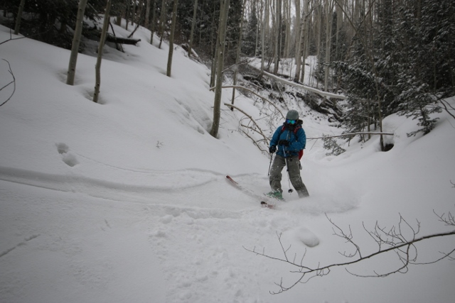 Adam skis through the large gully in Hall Canyon on the way back to the car. (Photo: Jared Hargrave - UtahOutside.com)