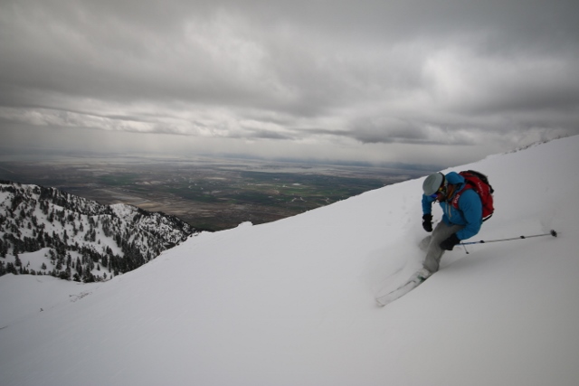 Adam Symonds skis a south-facing slope in the Wellsville Mountains as a storm approaches from the west over the Great Salt Lake. (Photo: Jared Hargrave - UtahOutside.com)