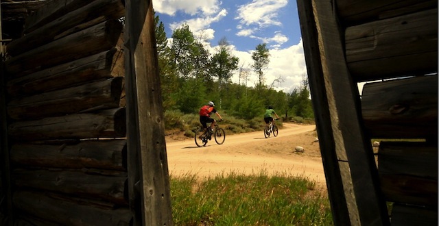 The start of the Fisher Creek Loop goes by old cabins on a double track road. (Photo: Jared Hargrave - UtahOutside.com)