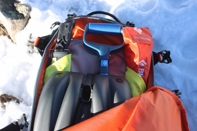 The avalanche gear pocket has organization slots and fits everything you need like snow shovel, probe, and even a snow saw. (Photo: Jared Hargrave - UtahOutside.com)