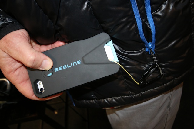 The Beeline Case in action with the carabiner clipped to a pocket zipper. The cord is short enough that your phone won't hit the floor if you drop it. (Photo: Jared Hargrave - UtahOutside.com)