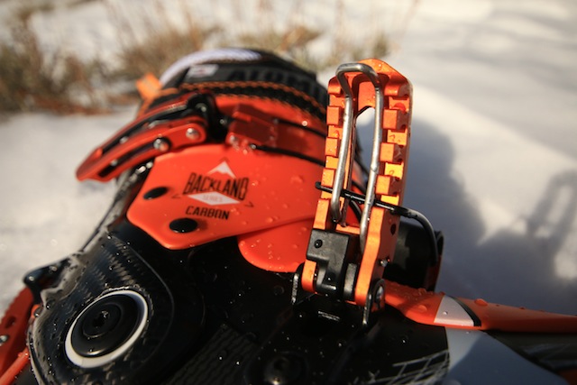 The lower buckle also has a latch to keep the buckle wire in place. It takes practice to get develop a system of readjusting the buckles quickly when transitioning. (Photo: Jared Hargrave - UtahOutside.com)