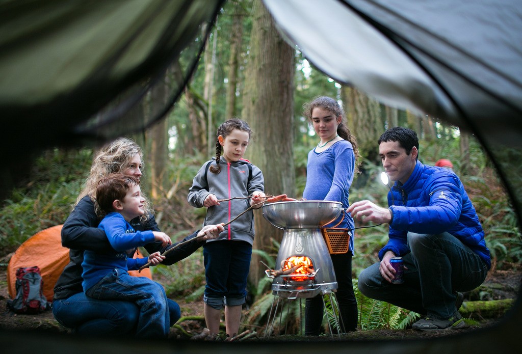 The BioLite Base Camp cooks as well as charges mobile devices.