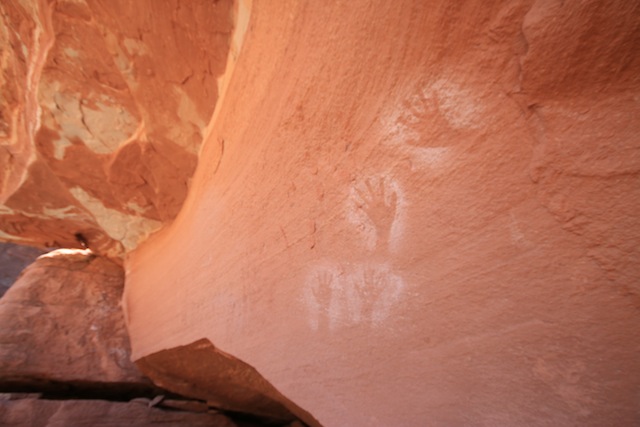Lathrop Canyon features granaries and pictographs, including these mysterious hand prints on the sandstone walls. (Photo: Jared Hargrave - UtahOutside.com)