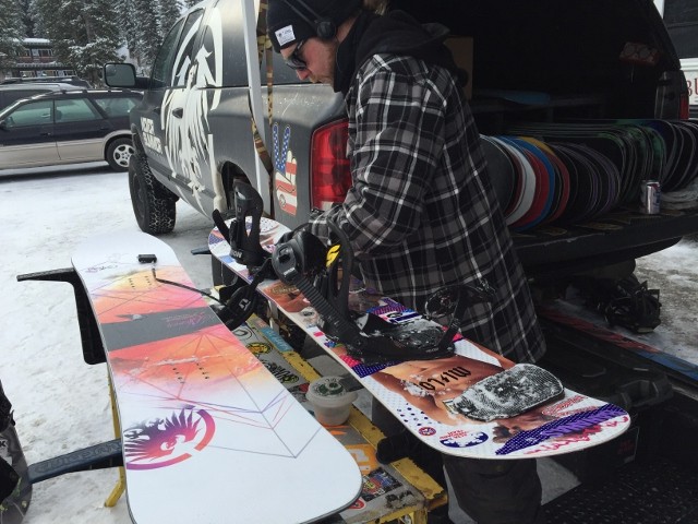 What's better than riding a brand new deck? Having some one switch out your bindings while you wait! (Photo: Ryan Malavolta/Utahoutside.com
