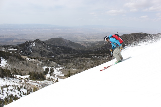 Adam Symonds skis high above the southern Utah desert on the west face of Mount Ellen's South Summit. (Photo: Jared Hargrave - UtahOutside.com)