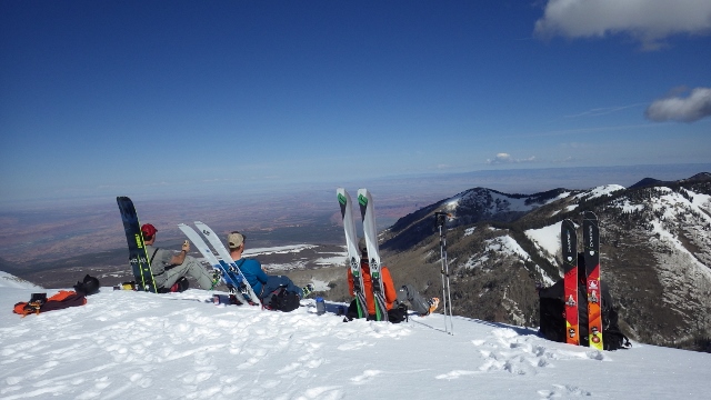 The crew lounges on the Haystack Mountain summit on a perfect La Sal Mountain morning. (Photo: Sean Zimmerman-Wall)