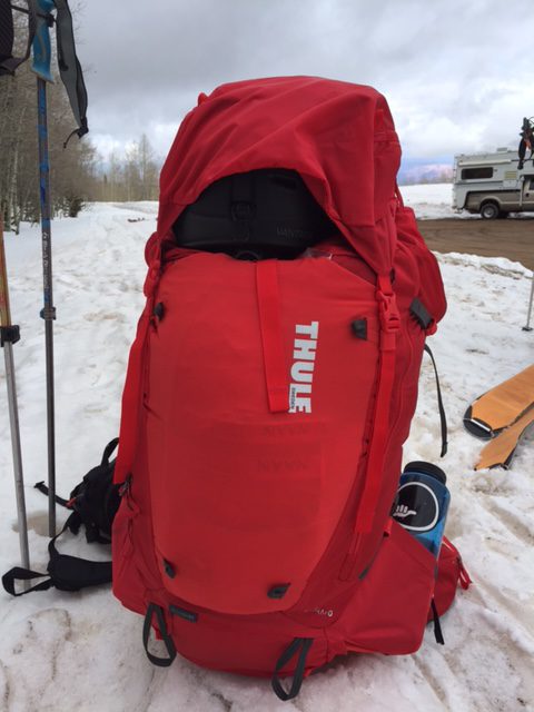 The Thule Versant 70L backpacking pack on the trailhead to a yurt trip in the La Sal Mountains. Its is fully stuffed with ski gear and overnight clothes and a sleeping bag. (Photo: Jared Hargrave - UtahOutside.com)