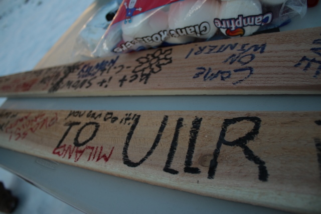 Alta skiers wrote messages to Ullr on "skis" before sacrificing them on the fire. We hope the gods get the message. (Photo: Jared Hargrave - UtahOutside.com)
