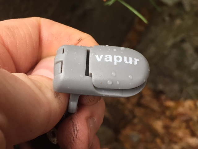 This small clip is what keeps the bite valve attached to a pack strap. It does not work very well, especially when you're on the move. (Photo: Jared Hargrave - UtahOutside.com)
