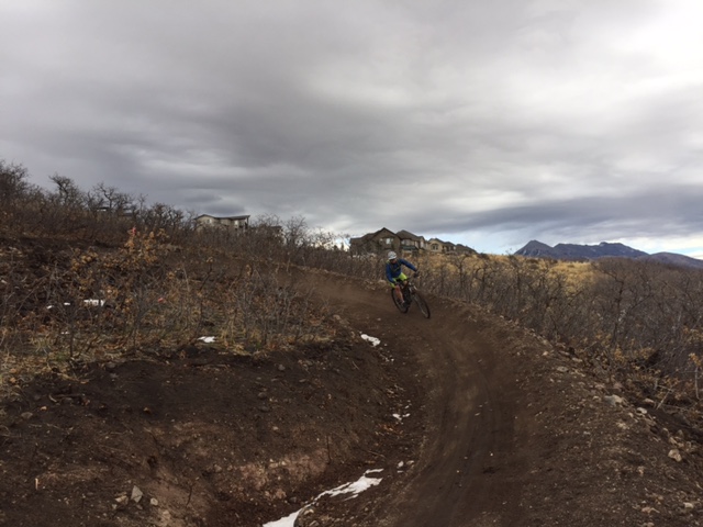 The high-walled berms come early and often on the new Vertigo Trail in Draper. (Rider: Mason Diedrich. Photo: Jared Hargrave - UtahOutside.com)