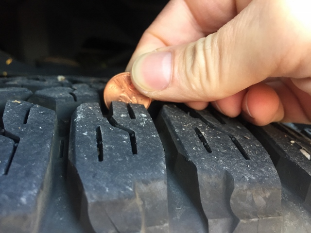 Check tires for enough tread